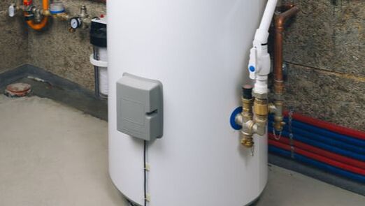 Newly installed water heater with blue and red pipes